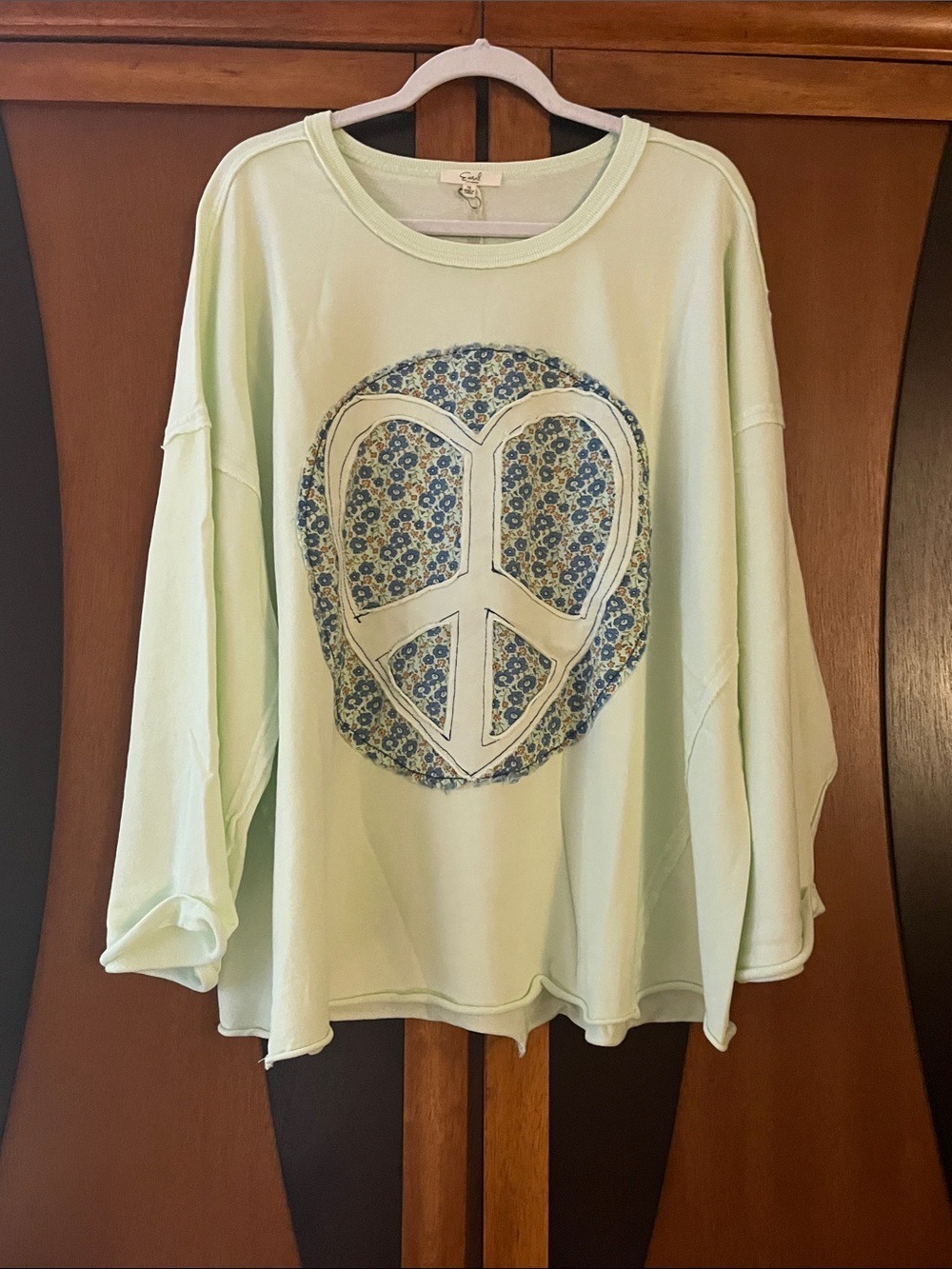 NWT Easel Peace Heart Light Green Long Sleeve Top w/Floral Accent & Rolled Hems